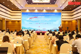 新闻发布会场景。图自越通社