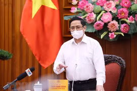 越南政府总理范明政：研究建立新冠疫苗基金