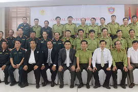 越南林政管理局与老挝林业监察局