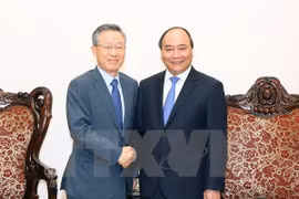 阮春福总理与韩国总理办公室政策协调办公室前主任尹大熙