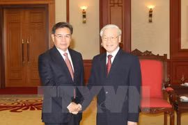 越共中央总书记阮富仲​会见老挝建国阵线中央委员会主席赛宋蓬·丰威汉