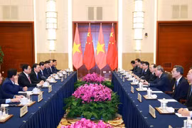 越南政府总理范明政同中国国务院总理李强举行会谈