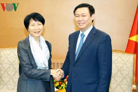 越南政府副总理王廷惠与全球环境基金执行机构首席执行官艾希女士