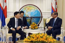 范平明副总理与柬埔寨代理首相韶肯​。（图片来源：baochinhphu.vn)