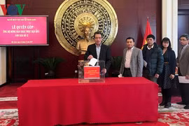 越南驻中国大使馆开展赈灾捐款活动援助灾民