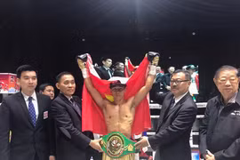 WBC亚洲职业拳击赛：越南武士陈文草夺冠