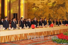 阮富仲​总书记和中国全国政协主席俞正声一同出席越中建交67周年纪念典礼(图片来源：越通社)