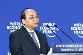 阮春福在全体会议上发言。（图片来源：越通社）
