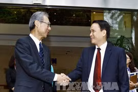 阮德利（右）与福山正喜