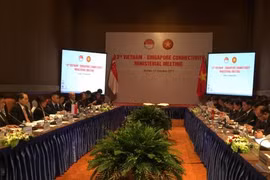 越新经济对接第13次部长级会议​场景。（图片来源：越通社）
