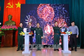 人民军队报网老挝语版和高棉语版开通仪式。（图片来源：越通社）