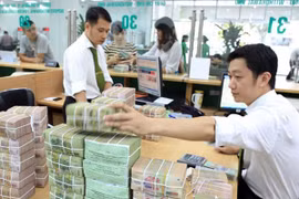  21日越盾兑美元中心汇率下降7越盾