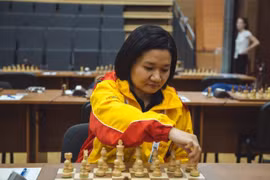 越南棋手黄氏宝簪在比赛中（图片来源：体育报）
