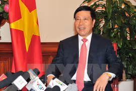 越南政府副总理兼外交部长范平明。（图片来源：越通社）