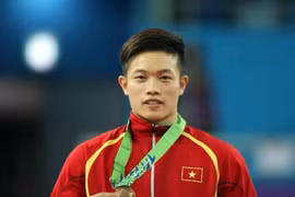 邓南为越南体育代表团夺得第九枚金牌