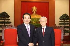 阮富仲总书记会见韩国国会议长丁世均。（图片来源：越通社）