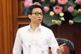 越南政府副总理武德儋在会上发表讲话。