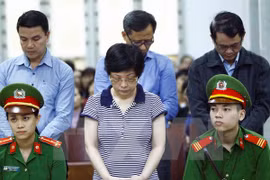 被告人周氏秋娥。
