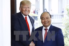 美国总统唐纳德·特朗普和越南政府总理阮春福。（图片来源：越通社）