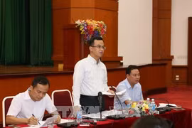财政部国际关系局局长武茹升在会议上发表讲话。（图片来源：越通社）