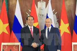 越南国家主席陈大光（左）与俄总统普京（右）。（图片来源：越通社）