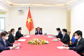 越南政府总理范明政与德国总理默克尔通电话