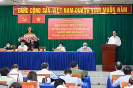 国家主席阮春福会见胡志明市古芝和霍门县选民