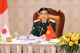 越南国防部长潘文江与俄罗斯国防部长绍伊古通电话