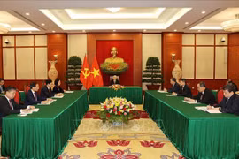 古巴媒体密集报道越古共产党领导电话会谈 