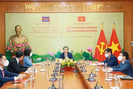 促进越共中央宣教部与柬埔寨人民党中央宣教委员会的合作