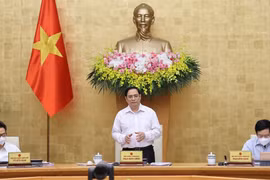 越南政府总理范明政主持政府6月例行会议