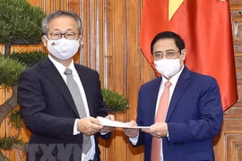 越南政府总理范明政会见日本驻越南大使山田贵雄