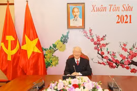 越共中央总书记、国家主席阮富仲与老挝人民革命党中央总书记通伦·西苏里通电话