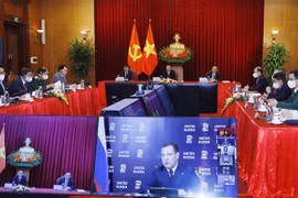 越南共产党代表团出席国际政党多边视频会议
