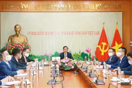 越共中央检查委员会主任陈锦绣与中共中央纪律检查委员会书记赵乐际举行视频会见