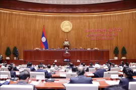越南党和国家领导人向老挝国家、政府和国会致贺电
