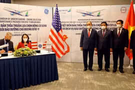 越南国家主席阮春福出席越竹航空与美国通用电气航空价值达20亿美元的合作协议签署仪式