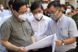 范明政总理：从现在到月底将有至少200万剂新冠疫苗到达胡志明市