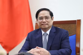 越南政府总理范明政与美国总统气候特使克里通电话