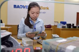 12月23日上午越盾对美元汇率中间价继续下调10越盾