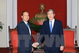 越共中央书记处常务书记丁世兄会见柬埔寨人民党中央办公厅主任（图片来源：越通社）