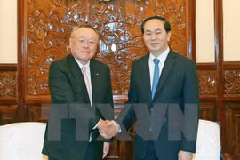 越南国家主席陈大光会见来访的日本丸红株式会社东盟地区首席执行总裁桑山正治（图片来源：越通社） 