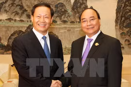 越南政府总理阮春福会见中国广西壮族自治区党委书记彭清华（图片来源：越通社）