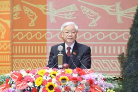 阮富仲同志向大会作报告（图片来源：越通社） 