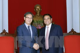 越共中央组织部部长范明正会见老挝新任驻越大使