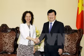 越南政府副总理郑廷勇会见来访的中国云南省副省长李江。（图片来源：越通社）