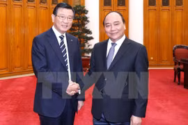 阮春福总理与朴三求董事长。