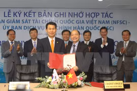 越南与韩国代表签署证券合作备忘录（图片来源：越通社）