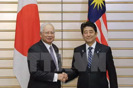日本首相安倍晋三和马来西亚总理纳吉布举行会谈（图片来源：越通社）