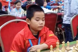 越南棋手邓英明夺男子8岁组别超快棋冠军（图：Vietnamchess）